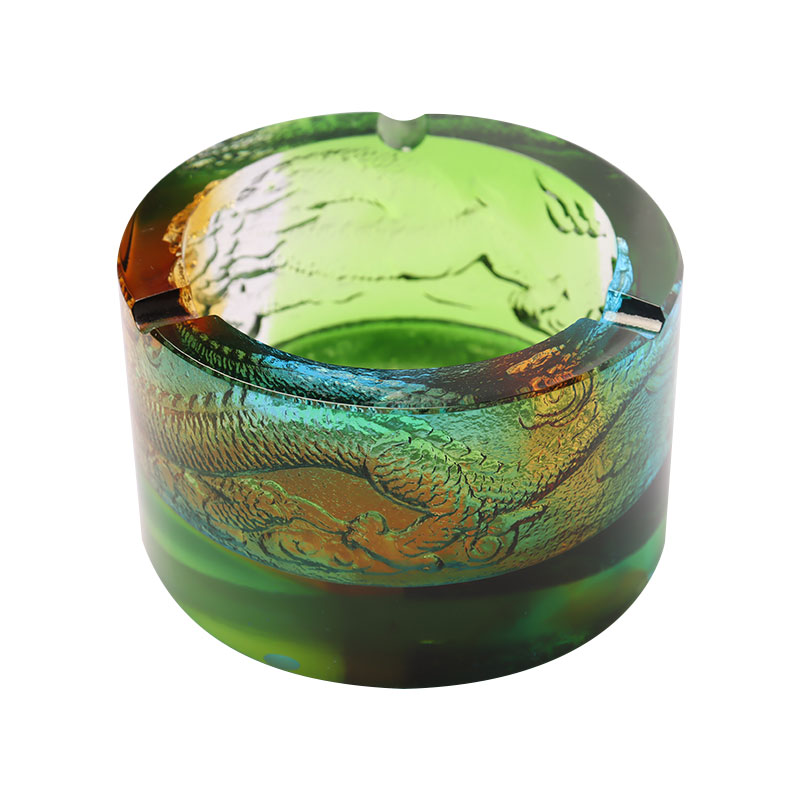 Glasaskebæger med drage-ud-af-havet mønster