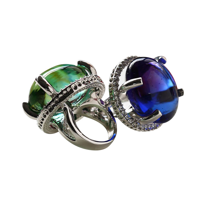 Transparent blue/green oval prong style glass ring