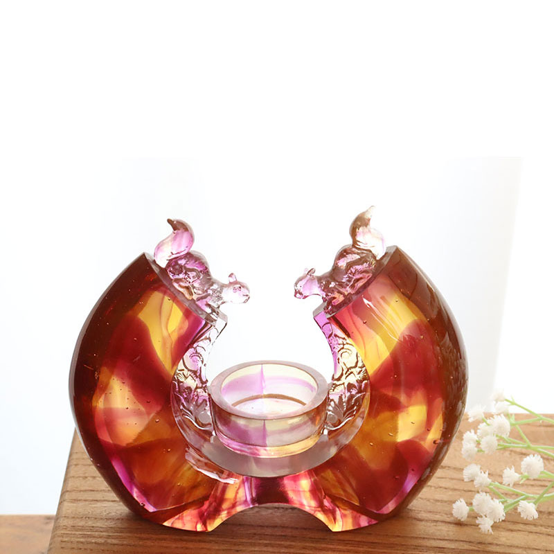 Lilla farvet glasur lysestage