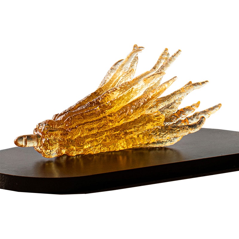 Håndformet røgelsesholder i gyldent glas