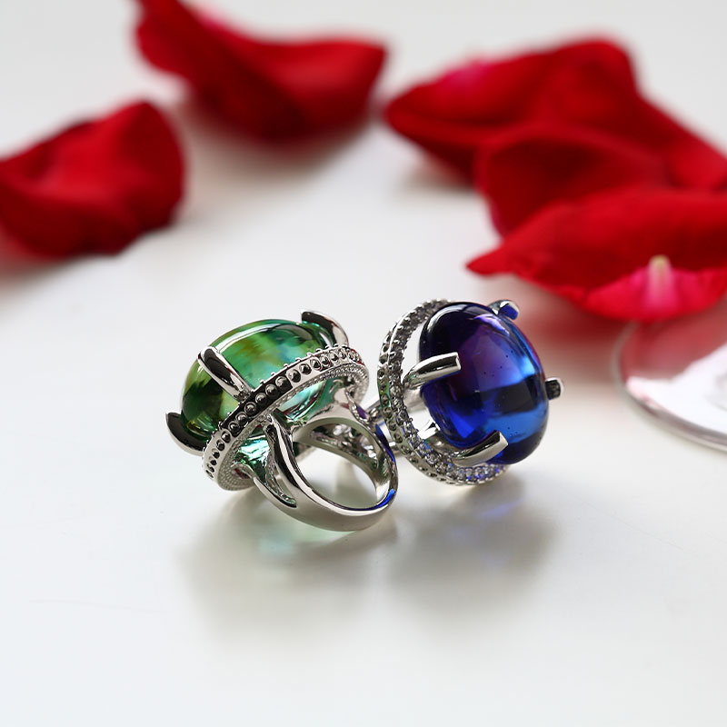 Transparent blue/green oval prong style glass ring