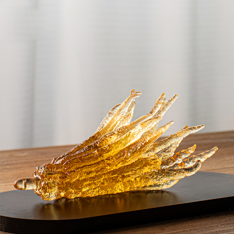 Håndformet røgelsesholder i gyldent glas