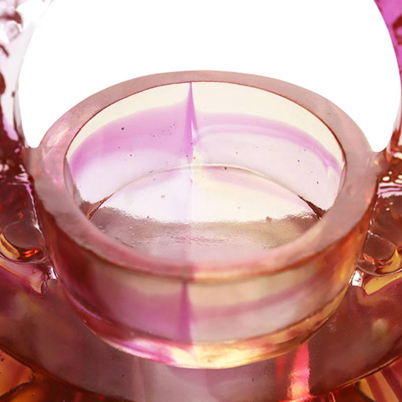 Lilla farvet glasur lysestage